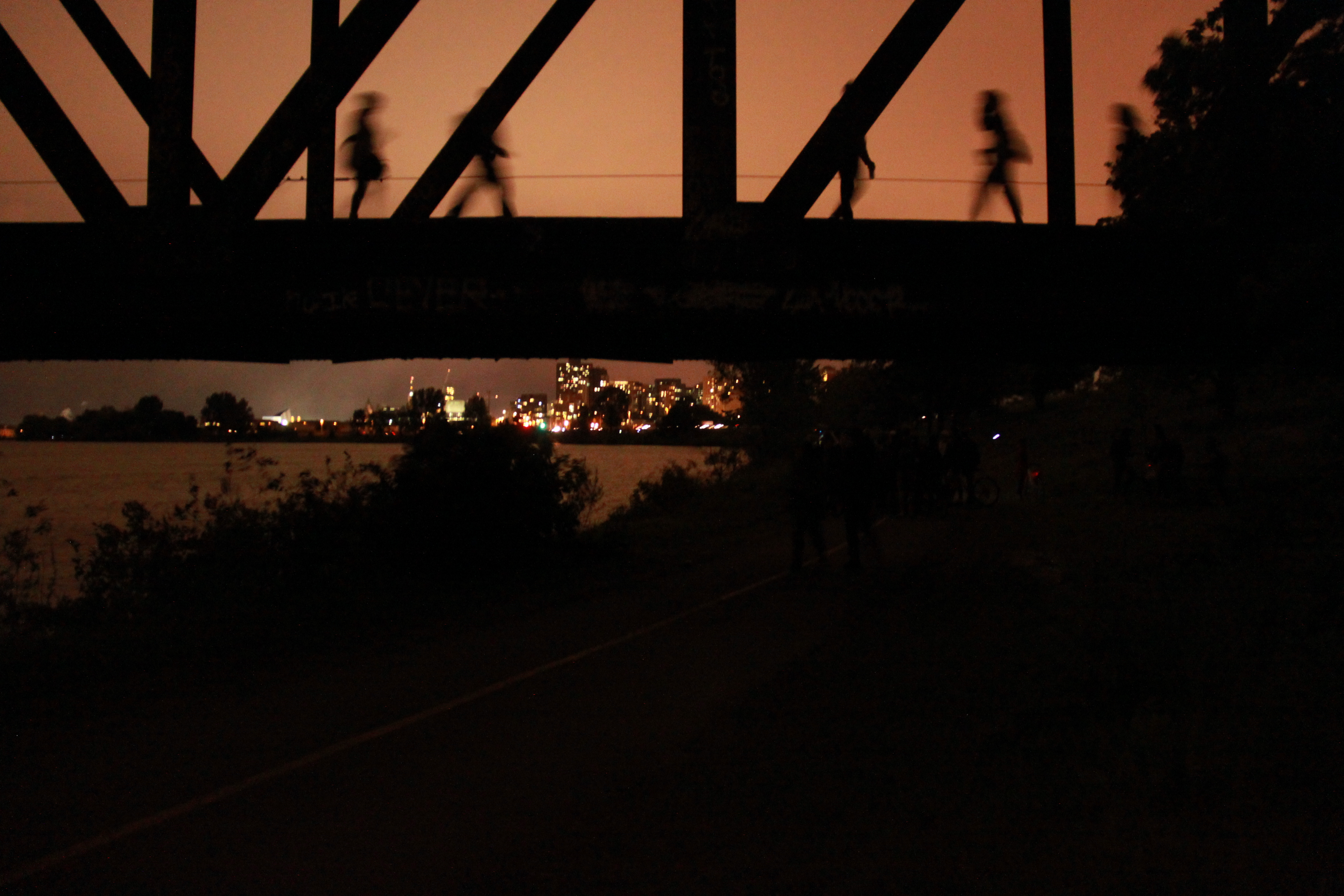 Heading home after the Canada day fireworks by the Prince of Whales bridge in Ottawa, Ontario.