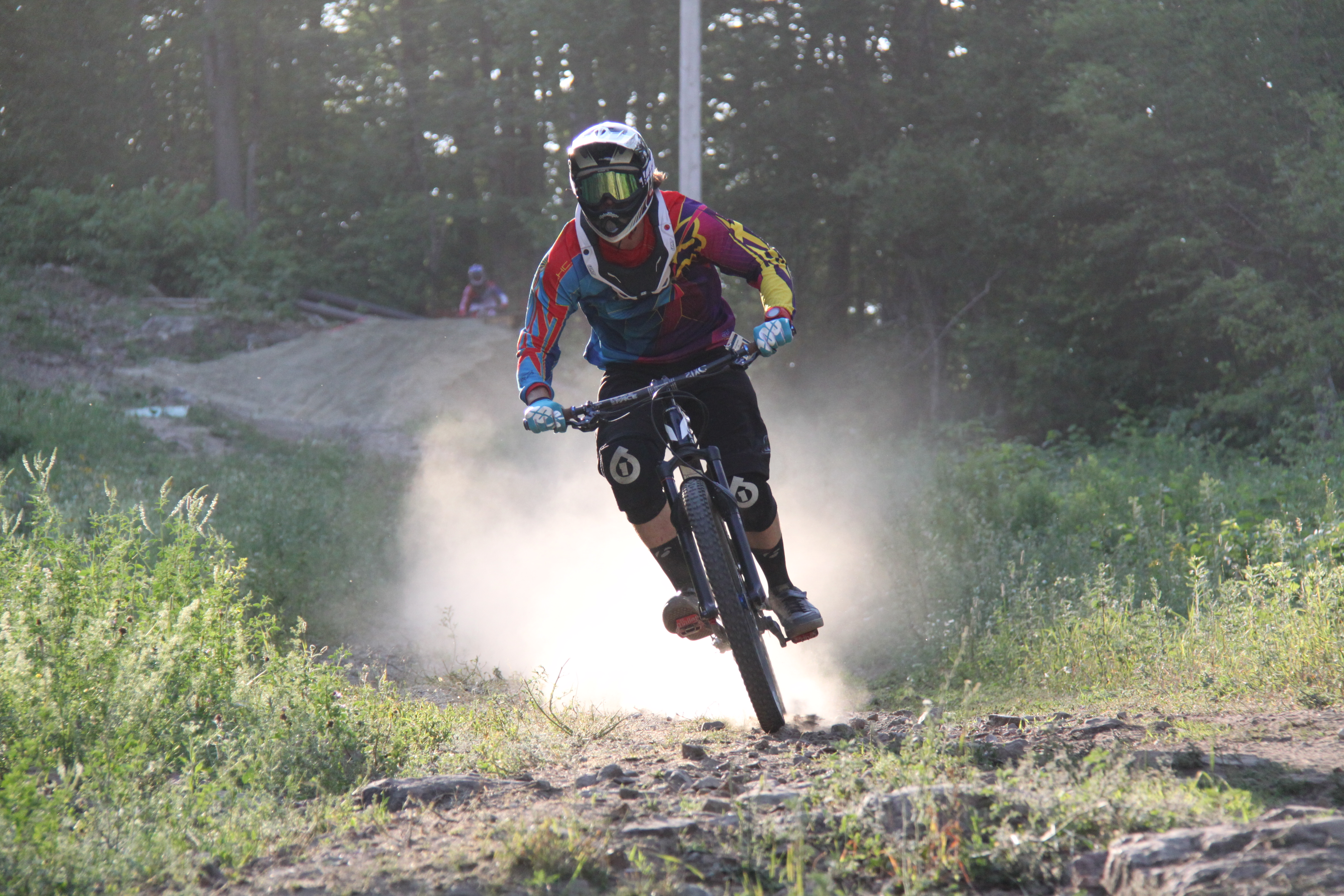 Downhill rider riding the lower Salamander trail at Camp Fortune, Chelsea, Quebec.